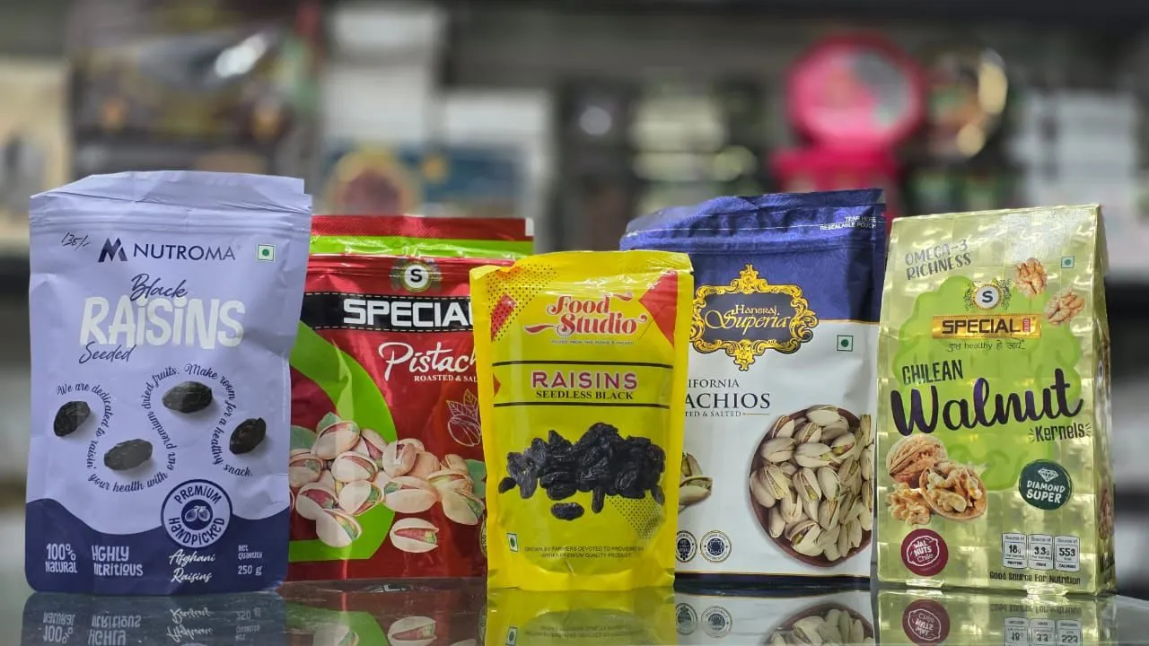 Packed raisins, pistachios and walnut kernels on the counter